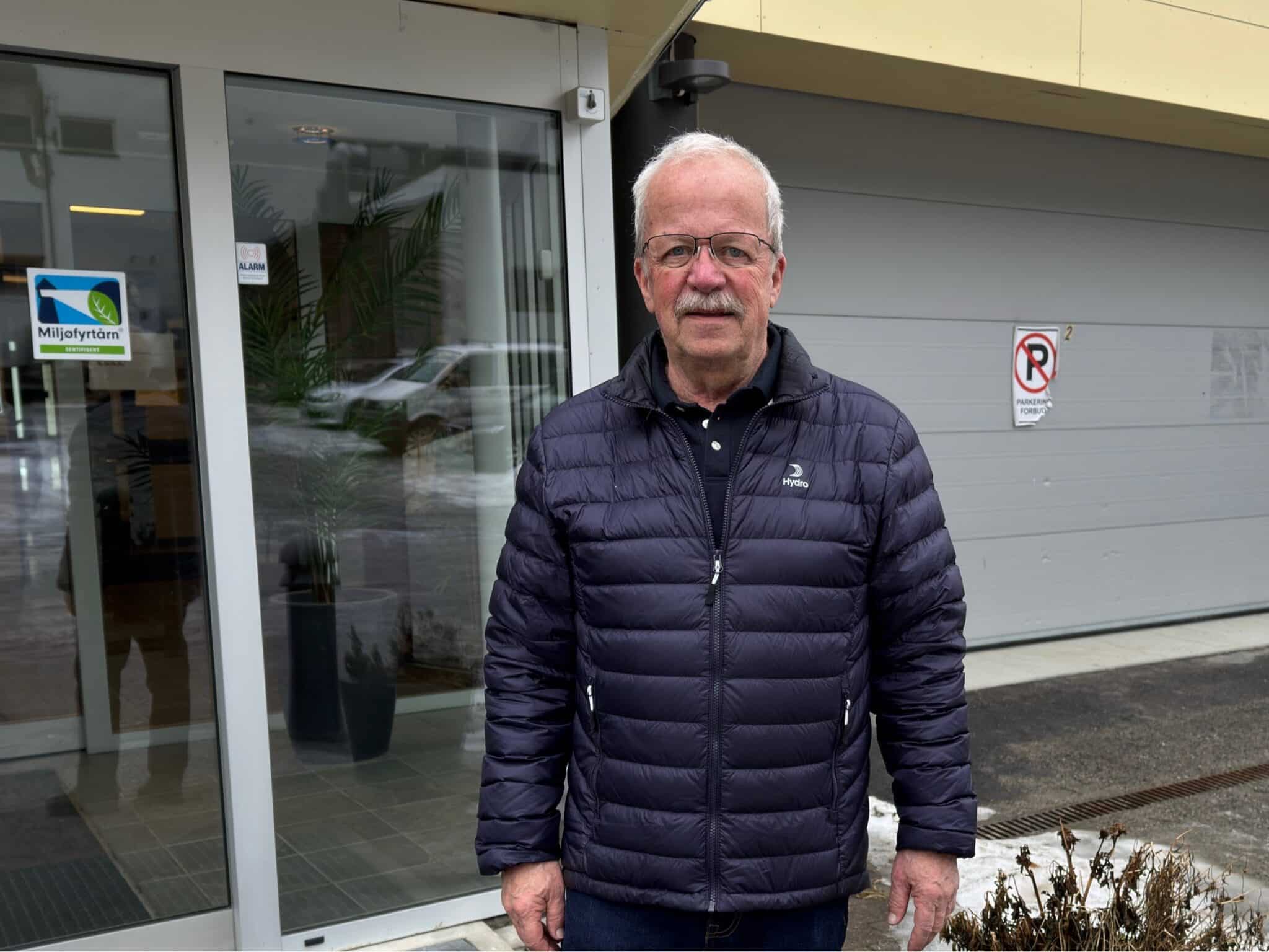a man standing outside a building